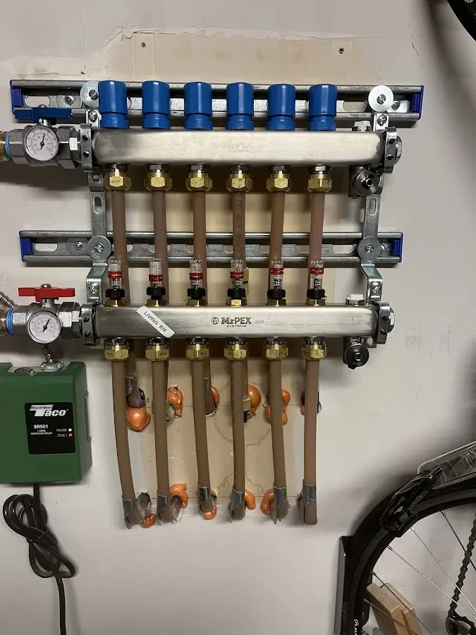 Plumber performing Leak Detection at a residential property in Williamsburg